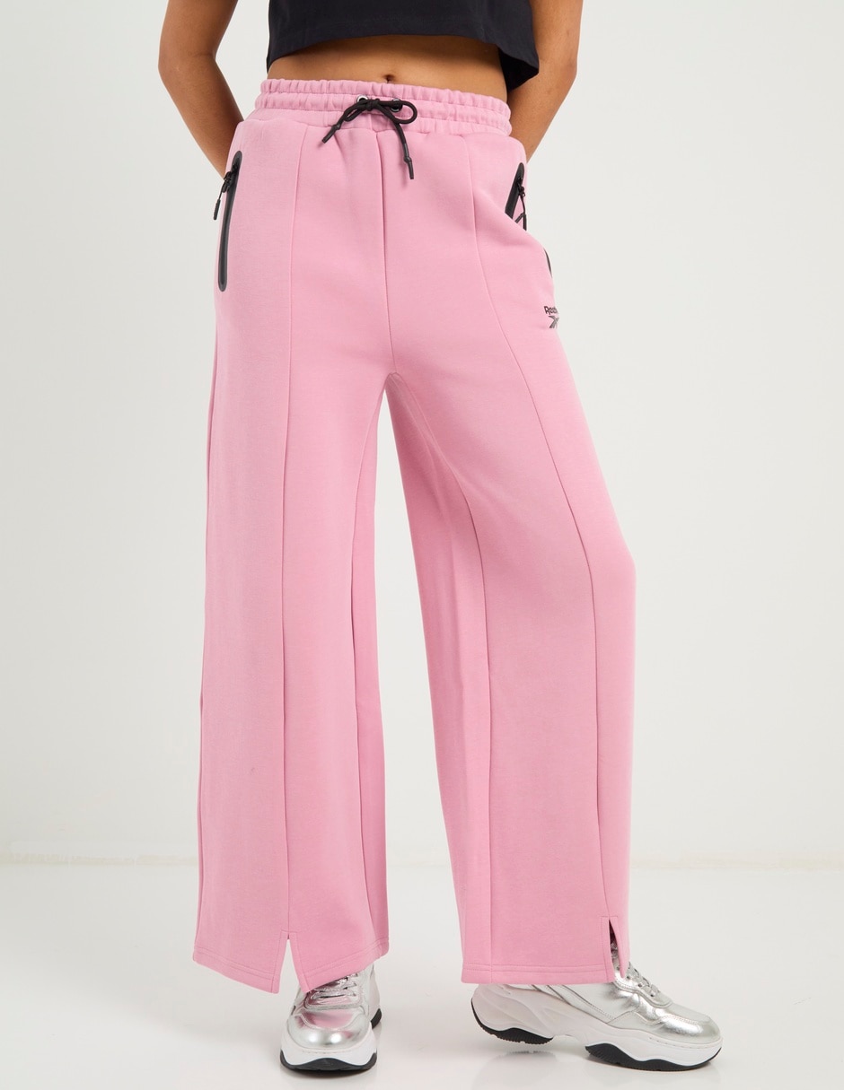 Pants acampanado Reebok con agujeta para mujer