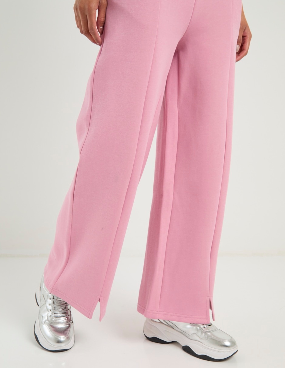 Pants acampanado Reebok con agujeta para mujer