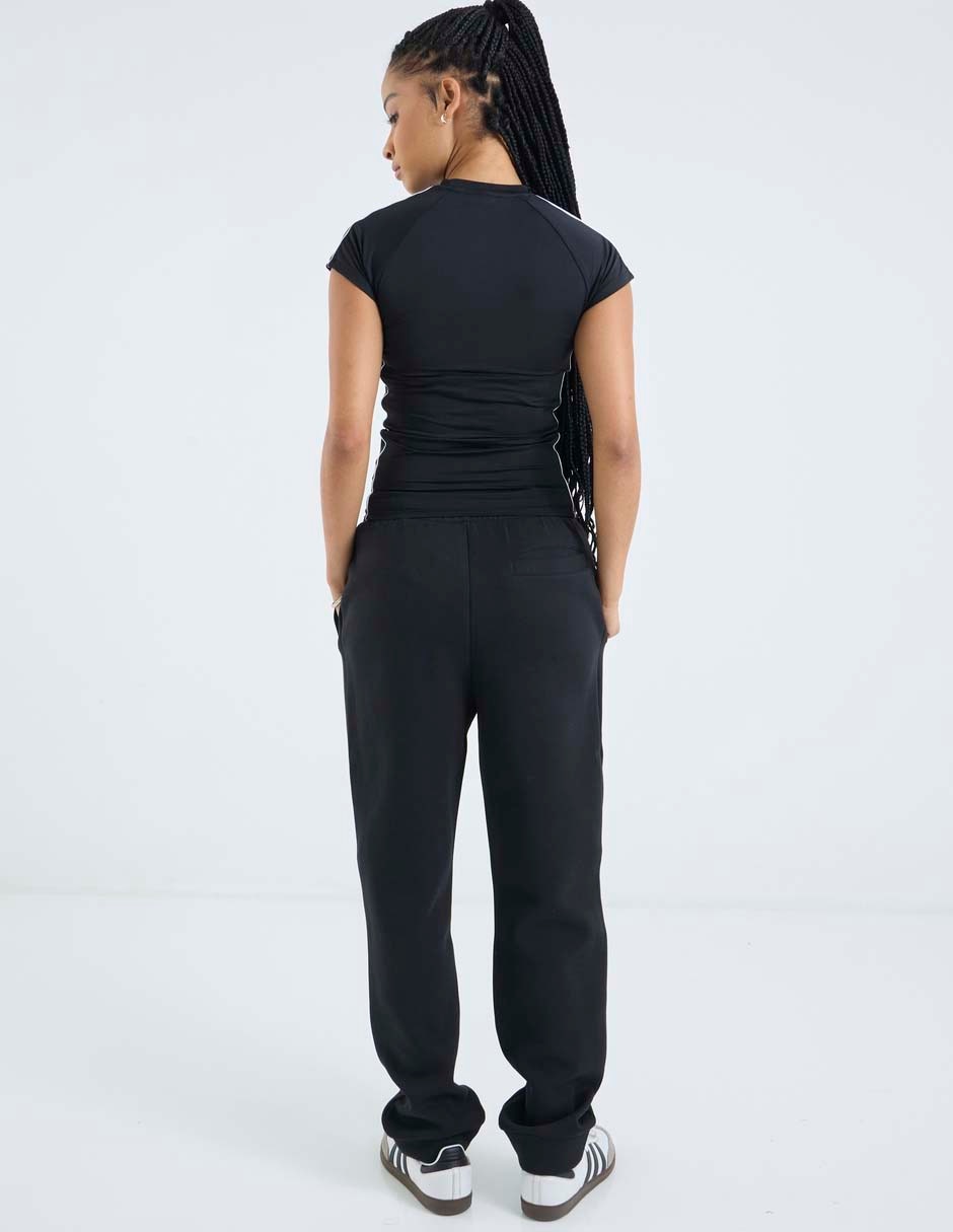 Pants slim Reebok con elástico para mujer