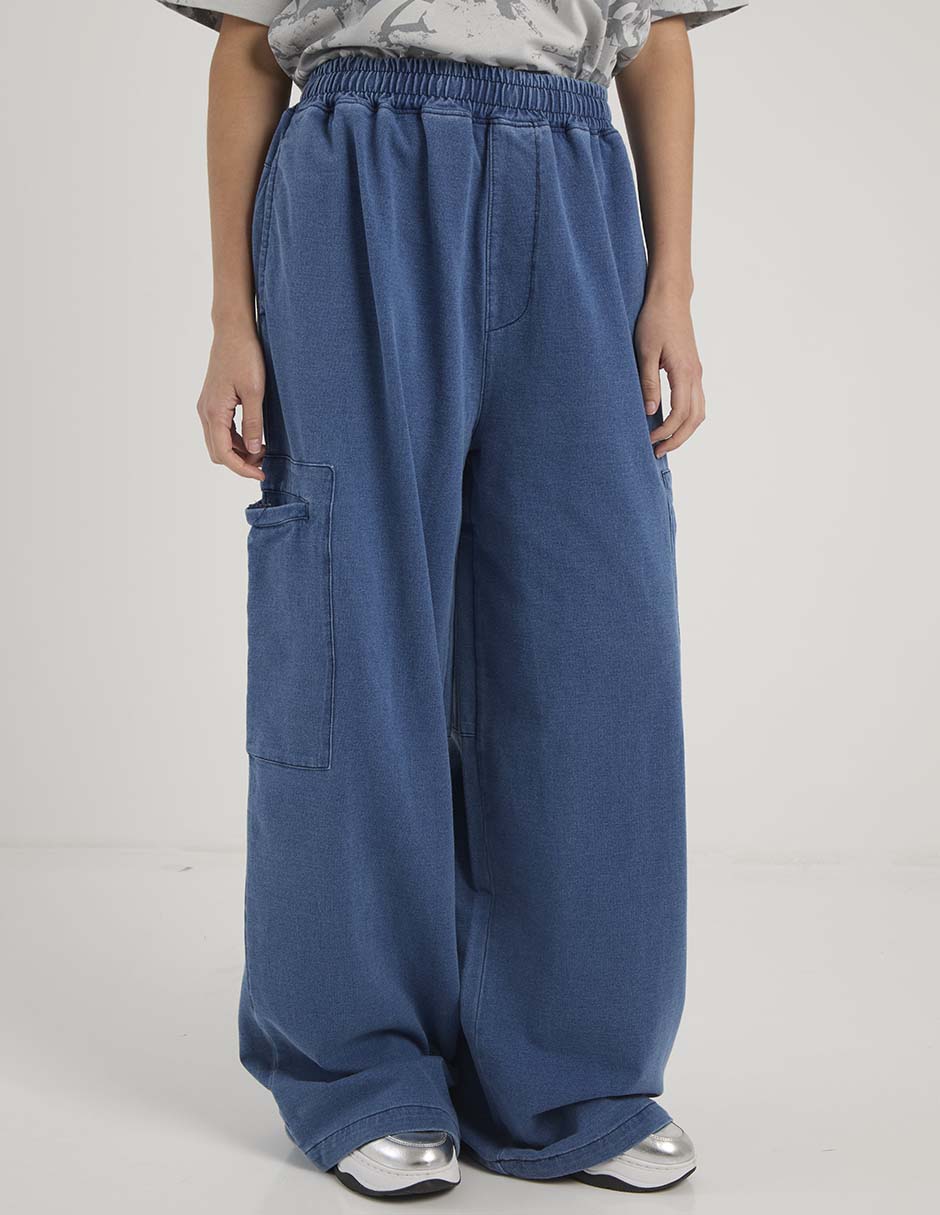 Pants acampanado Reebok con elástico para mujer