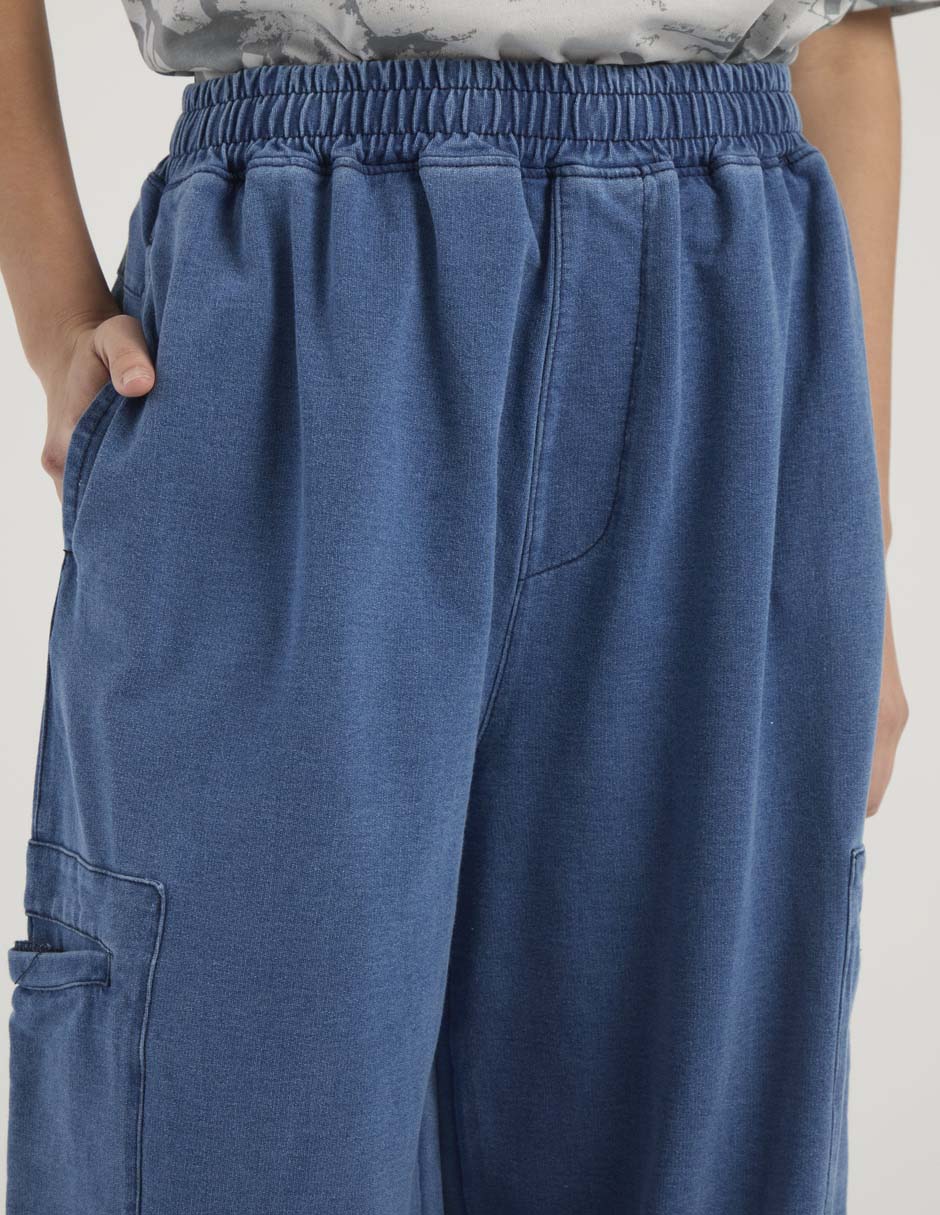 Pants acampanado Reebok con elástico para mujer